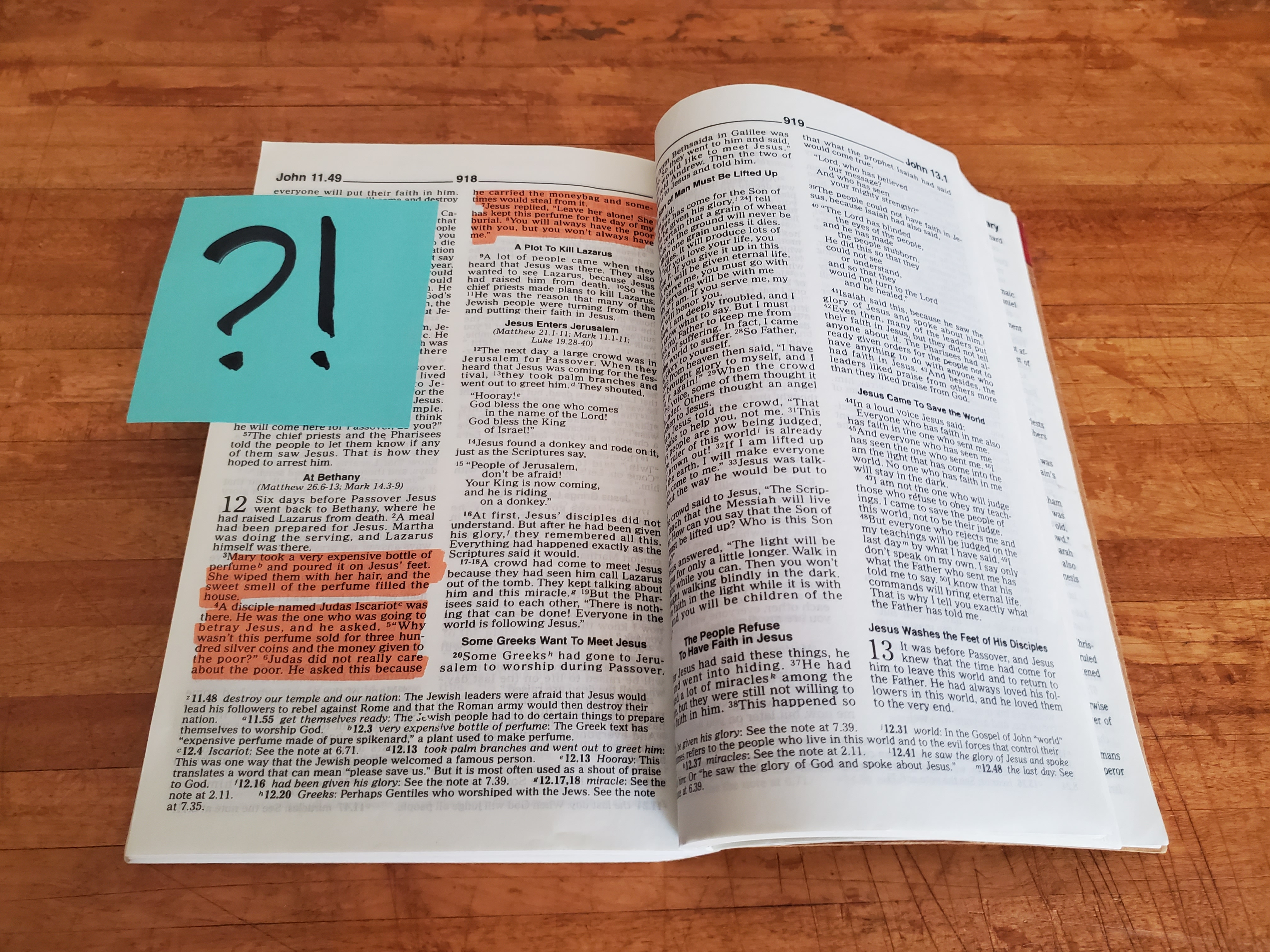 Open Bible with highlighting and notes.